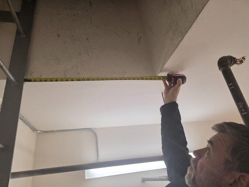 Conducted site assessment of commercial cast iron boiler system at multi-building condominium complex. Performed comprehensive evaluation of heating equipment including measurement of installation clearances and inspection of control systems, piping connections, and ventilation components. Client seeking proposals for equipment repair/replacement options to replace current service provider.