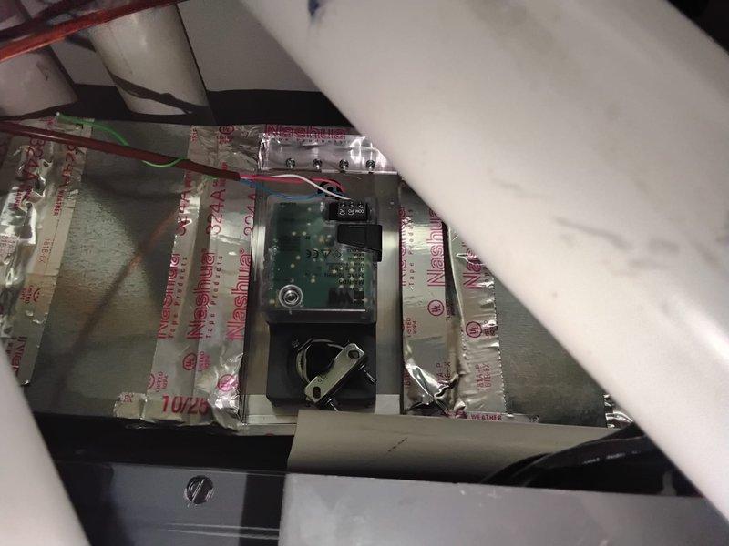 Completed installation of zone system control components, including wiring of dual humidifiers and connecting water lines. Installed circuit board modules within the ductwork and secured all control wiring with appropriate grommets and zip ties. Temporary thermostat installed for first floor system; second/third floor system requires 4×4 wall plate with center hole and grommet to properly cover thermostat wire box.