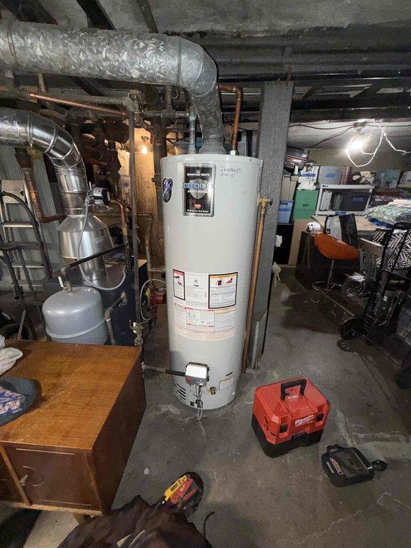 Performed boiler clean and check service that was overdue since 2023. Inspected water heater system and associated plumbing components, including a reducing valve rated for 125 PSI maximum pressure and 225°F maximum temperature. Documented condition of copper piping showing signs of normal aging and potential corrosion at connection points.