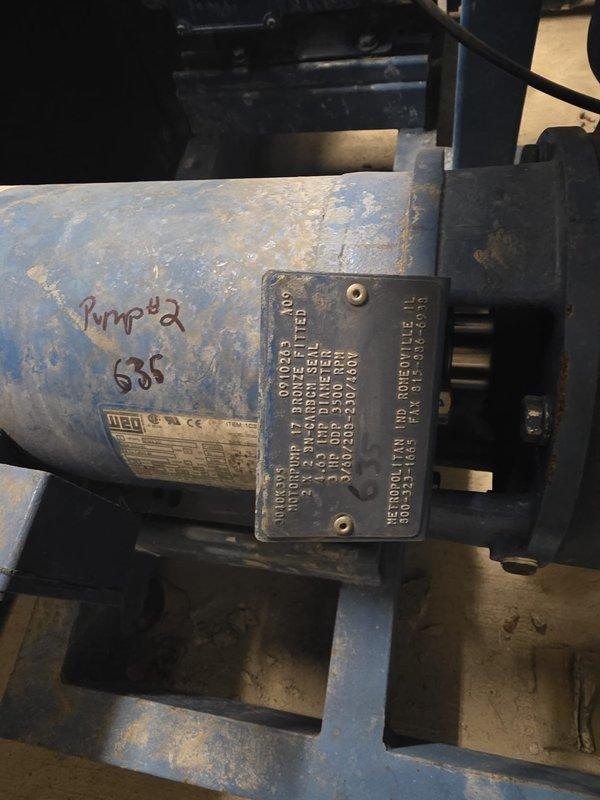 Conducted site assessment of mechanical equipment at multi-building condominium property to evaluate maintenance requirements. Inspected circulation pump system showing signs of wear, including a blue WEG pump labeled "Pump #2" and a brass hot water recirculation pump connected to PVC piping. Documented current equipment condition with photographs to prepare comprehensive maintenance proposal as requested by the board president.