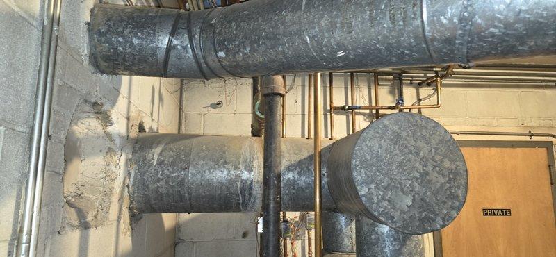 Conducted site visit to obtain detailed measurements of existing boiler system and associated piping infrastructure. Documented complete dimensional specifications of the mechanical room, including galvanized ductwork, vertical fire suppression line, and primary HVAC components. Photography was taken of the installation to support future engineering requirements and equipment specifications.