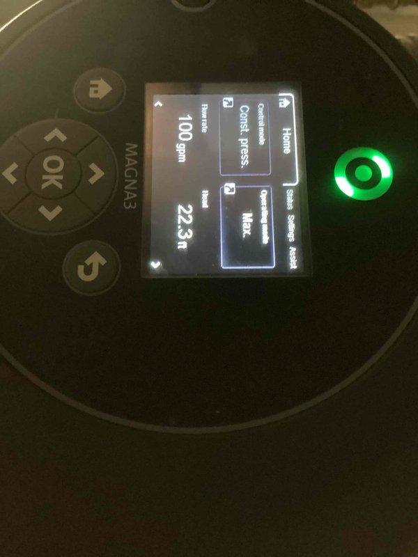 Diagnosed Central Heat Pump showing "Collect Continuation of time" error code on the MAGNUM3 control interface. Inspected system pressure (100 psig) and inlet readings (22.3ft) while verifying proper operation of the Grundfos circulation pumps, which were functioning normally with no visible issues in the hydronic distribution system.