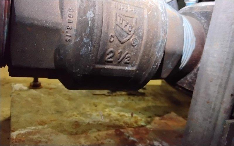 Returned to site to collect booster pump data as requested. Documented 2½" pipe fittings and connections with detailed photographs for reference. All components appear operational despite showing normal wear.