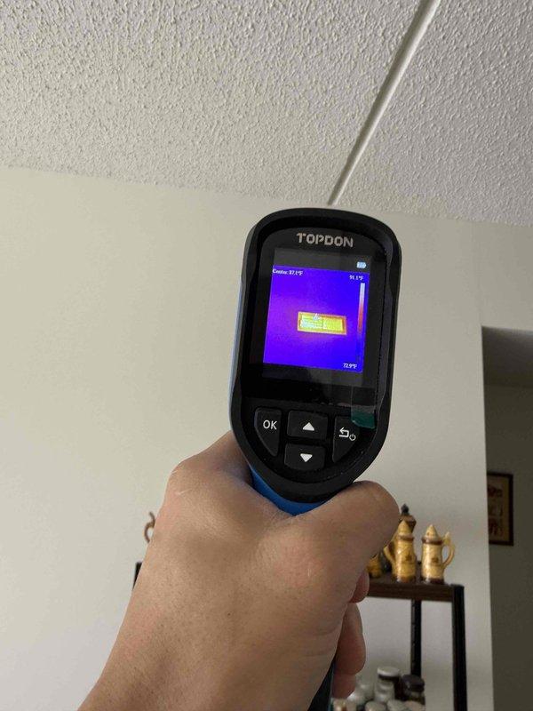 Responded to service call for non-functional thermostat stuck at 74°F with unresponsive controls. Performed thermal imaging diagnostics using TOPDON device to identify temperature differentials at register/vent areas, confirming actual ambient temperature of 72.9°F. Resolved control interface issue and restored normal thermostat operation.