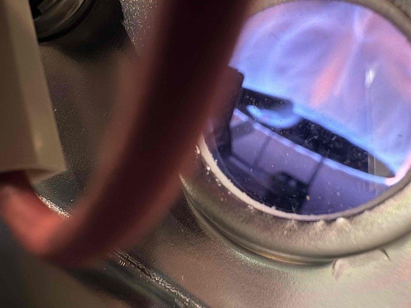 Successfully replaced existing 40-gallon water heater with new Bradford White 50-gallon model. Installed unit against brick wall in utility room, connected all necessary water lines and gas supply. Tested system for proper operation, confirming strong blue flame combustion and no leaks at connections.