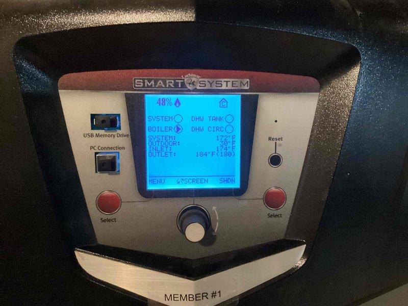 Responded to warranty service call for multi-boiler system. Diagnosed control panel issue on Member #1 showing operational data (Outdoor: 18°F, Outlet: 127°F, Inlet: 104°F) while second boiler was completely non-operational. Addressed startup noise issue with master boiler that was previously reported during high wind conditions.