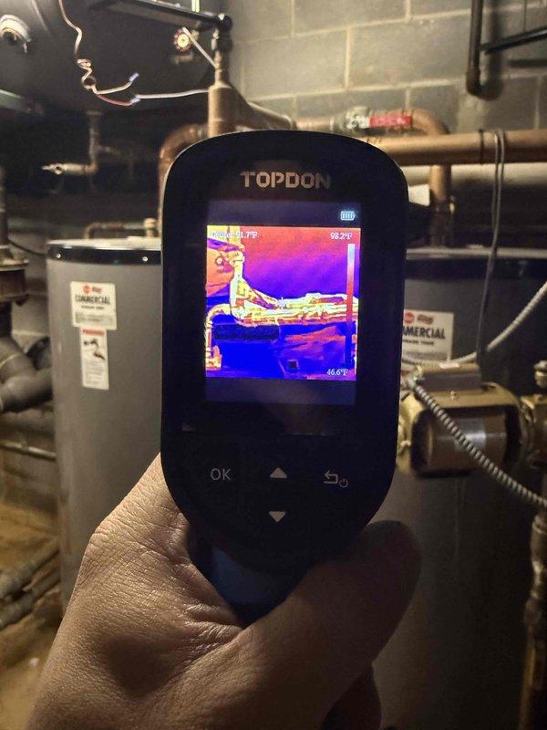 Responded to no hot water call at commercial property. Used thermal imaging to diagnose temperature issues in the water heating system, identifying significant temperature variations across the piping infrastructure. Successfully restored hot water service by resetting system switches and verifying proper operation of commercial water heaters.