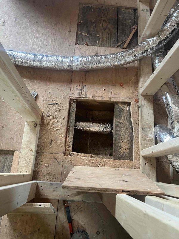 Completed Unico system modifications for third floor renovation, including rerouting existing return air and thermostat wiring to new mechanical closet. Installed five new supply runs through attic space for reconfigured bedrooms and bathroom. Repaired damaged second floor trunk line and redirected six existing supply runs through floor joists to connect with trunk line, ensuring proper airflow throughout the renovated spaces.