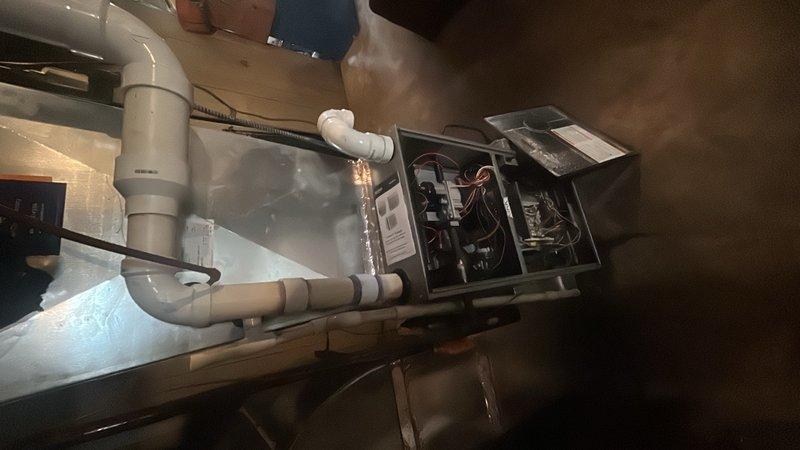 Diagnosed non-ignition issue on furnace where customer reported thermostat set to 70°F with actual temperature reading 58°F. Inspection of the unit revealed electrical component malfunction requiring replacement of control board and associated wiring. Complete system evaluation determined aging unit would benefit from full replacement rather than continued repairs to ensure reliable heating performance and proper ventilation through existing PVC ductwork.