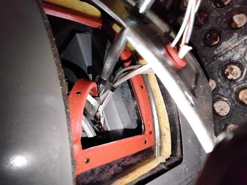 Responded to service call for a leaking furnace that was installed by a previous contractor. Upon inspection of the beige unit with ventilation grille, identified corrosion on electrical connections and deterioration of internal components including mounting brackets and terminal points. Documented condition with photos and provided customer with replacement options.