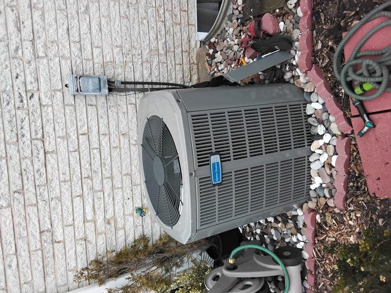 Performed complete Clean and Check service on AC system per Platinum Plan. Conducted electrical diagnostics using UEi Pro DL379 True RMS clamp meter to verify proper amperage and voltage readings across all components. Inspected outdoor condenser unit, which is properly installed on stone base with adequate clearance for airflow.