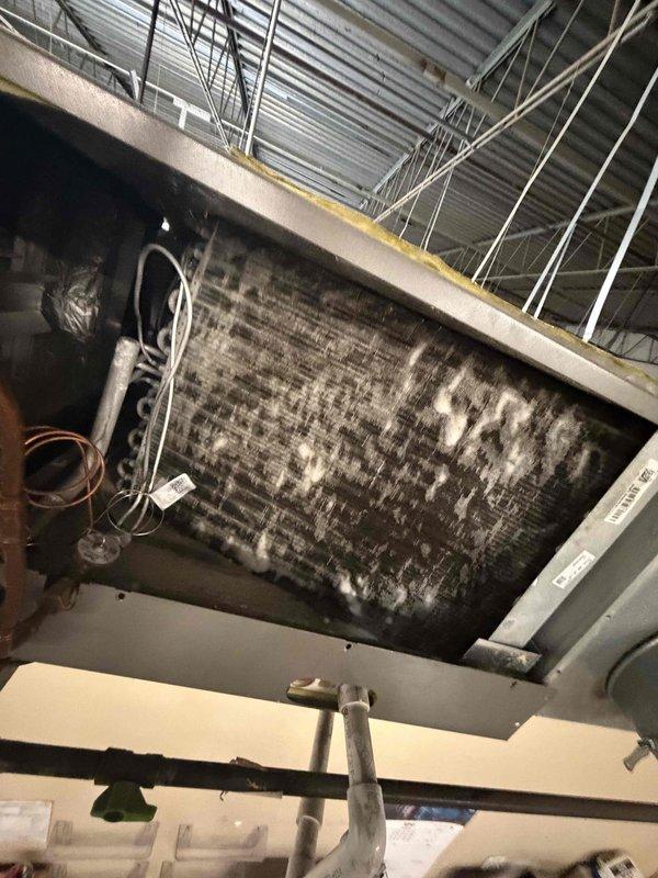 Performed thorough blower and evaporator coil cleaning on commercial HVAC system that exhibited significant dust and debris accumulation. Removed blower assembly for comprehensive cleaning and addressed heavily soiled evaporator coil to restore proper airflow and system efficiency. Photos documented condition before service for invoice submission to property management.