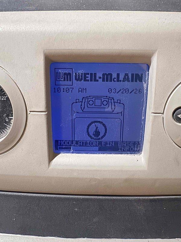 Responded to service call for recurring boiler lockout issue where temperature continues to rise. Diagnosed problem with Weil-McLain heating system control panel and inspected Wilo water circulation pumps. Previously replaced heat exchanger gasket during maintenance is functioning properly, but identified issue with modulation fan speed causing the temperature control problems.