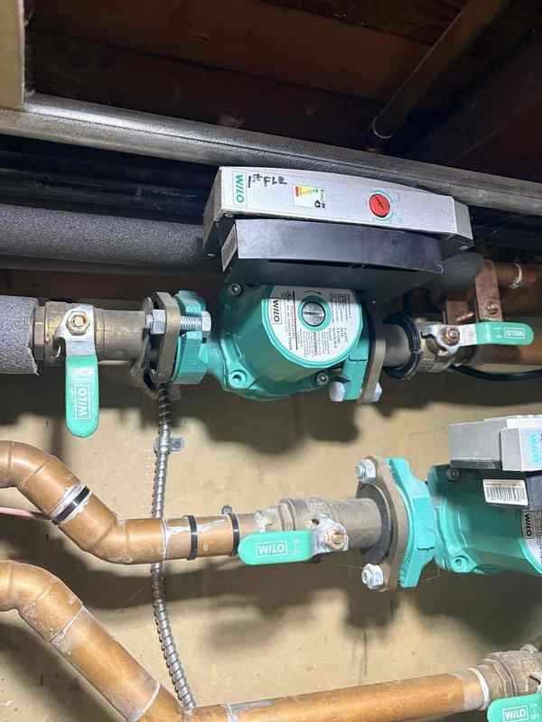 Responded to service call for recurring boiler lockout issue where temperature continues to rise. Diagnosed problem with Weil-McLain heating system control panel and inspected Wilo water circulation pumps. Previously replaced heat exchanger gasket during maintenance is functioning properly, but identified issue with modulation fan speed causing the temperature control problems.