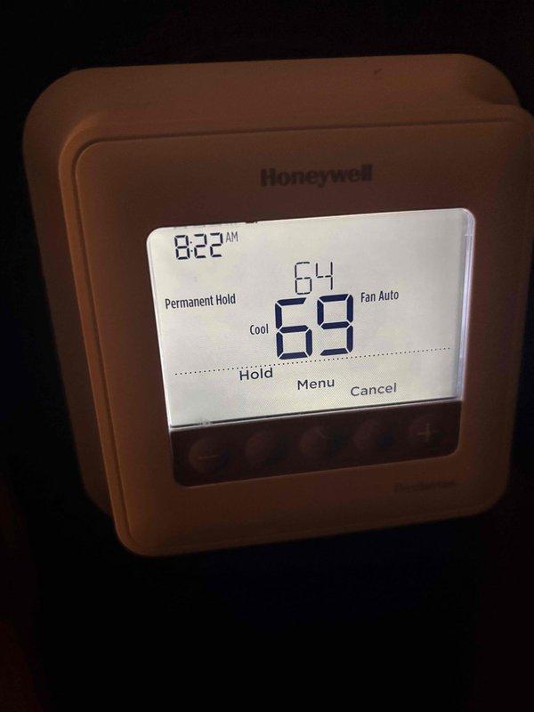 Completed scheduled maintenance on two HVAC systems under Comfort Plan. Performed comprehensive clean and check service on furnace/air handler and outdoor condensing unit. Inspected outdoor unit for proper installation and electrical connections, verified refrigerant lines were properly secured. Checked thermostat operation - confirmed cooling mode functioning correctly with temperature set at 64°F while ambient temperature was 69°F.
