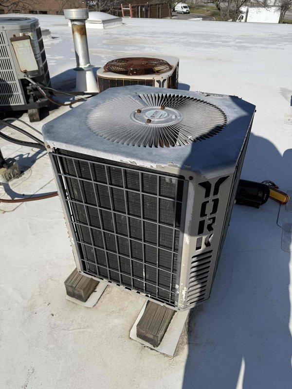 # Service Summary

Completed spring preventive maintenance inspection on commercial rooftop York air conditioning unit per prepaid maintenance agreement. Confirmed tenant availability prior to service as instructed. Performed comprehensive checklist including electrical diagnostics using digital multimeter to verify proper voltage and capacitor function. Inspected condenser coil condition, verified unit operation, and documented current equipment specifications and filter requirements. Flagged necessary updates to filter list for office records.