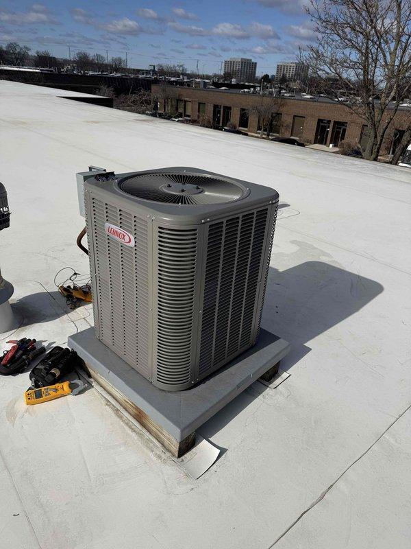 # Service Summary

Completed spring preventive maintenance inspection on commercial rooftop Lennox HVAC unit per CSA agreement. Performed comprehensive checklist including electrical diagnostics with clamp meter showing 498S reading, capacitor inspection, and visual assessment of all system components. Updated equipment and filter information for maintenance records and documented system condition with photographs.