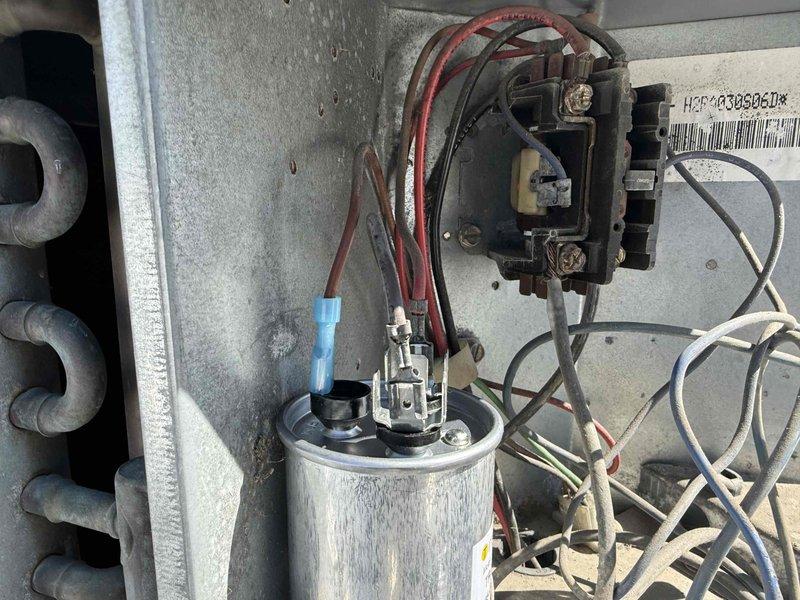 # Service Summary

Performed commercial HVAC preventive maintenance visit. Replaced failed dual-run capacitor (TITAN PRO TRCFD355, 35+5 MFD, 440/370 VAC) on outdoor condensing unit. Disconnected electrical connections, removed old capacitor showing signs of wear and deterioration, installed new capacitor, and reconnected all wiring to contactor and compressor terminals. Verified proper electrical connections and system operation upon completion.