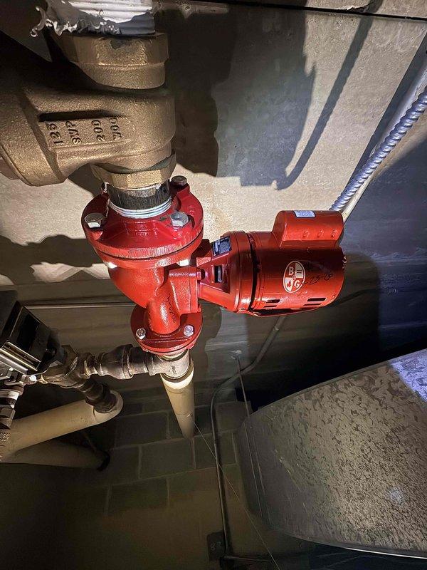 # Service Report: Commercial Circulator Pump Replacement

Responded to commercial facility for circulator pump replacement on heating system loop #5. Coordinated with on-site personnel for access and equipment stabilization during installation. Successfully removed failed pump assembly and installed replacement circulator unit on the hydronic heating system. Verified proper mounting, connection integrity of grooved pipe couplings, and system pressurization. Restored heating loop to full operational status and confirmed circulation performance met system specifications.