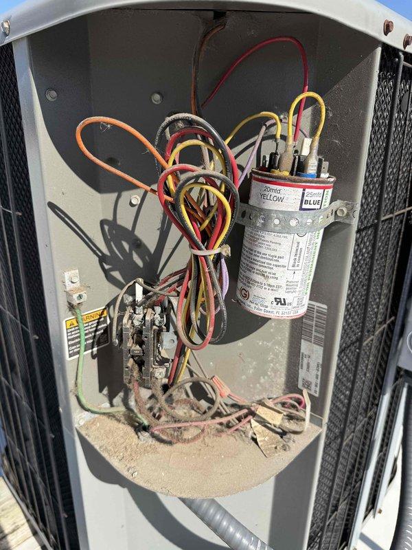 Completed spring preventive maintenance on commercial rooftop HVAC unit per prepaid service agreement. Performed comprehensive system inspection with checklist documentation, verified electrical components and capacitor operation with multimeter readings, captured equipment nameplate data and filter specifications for records update, and flagged necessary changes to filter inventory list. Unit interior showed accumulation of debris which was noted; all electrical connections inspected and system operational upon completion.