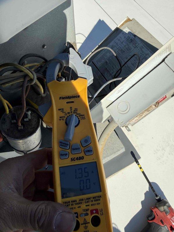 Completed spring preventive maintenance on commercial rooftop HVAC unit per prepaid service agreement. Performed comprehensive system inspection with checklist documentation, verified electrical components and capacitor operation with multimeter readings, captured equipment nameplate data and filter specifications for records update, and flagged necessary changes to filter inventory list. Unit interior showed accumulation of debris which was noted; all electrical connections inspected and system operational upon completion.