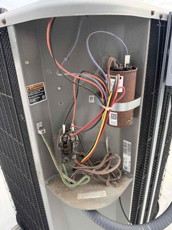 Completed spring preventive maintenance on commercial HVAC system including filter replacement and equipment inspection. Replaced air filter in air handler unit and performed electrical component inspection on outdoor condenser unit, noting capacitor showing signs of corrosion and discoloration that may require future replacement. Updated equipment and filter specifications per maintenance protocol.