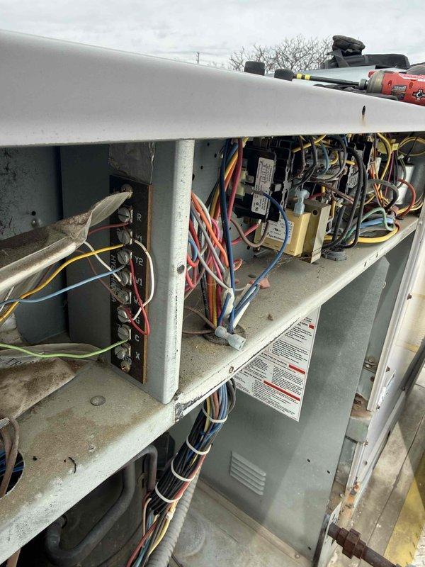 Completed spring commercial preventive maintenance on rooftop HVAC unit, performing comprehensive inspection of electrical components, refrigerant lines, capacitors, and contactors. Documented equipment specifications, inspected interior ductwork and insulation conditions, captured detailed photos of system components, and updated equipment and filter information per maintenance protocol.