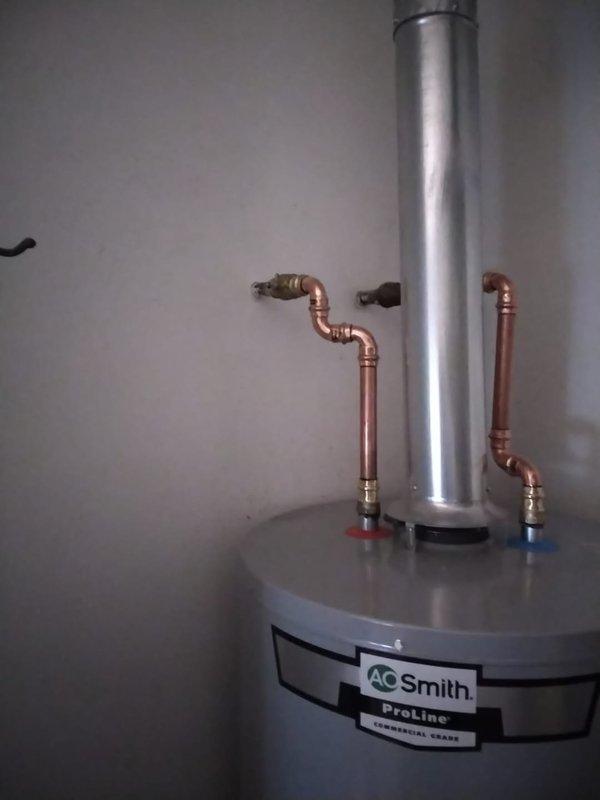 Completed full residential HVAC system replacement including removal and disposal of existing forced air furnace and installation of new Lennox 97% AFUE two-stage variable speed downflow 88k BTU furnace with connections to existing supply/return ductwork, gas line, electrical circuit, and exhaust system. Additionally removed and disposed of existing water heater and installed new A.O. Smith ProLine 50-gallon residential water heater with connections to existing gas, electric, water piping, and exhaust chimney. All equipment started up, tested, adjusted for proper operation, and passed complete safety inspection with warranties activated.