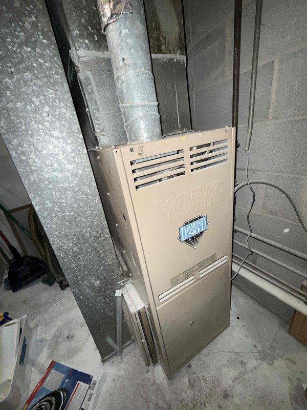 Completed spring preventive maintenance on commercial HVAC system including York and American Standard furnace units. Performed comprehensive checklist inspection, verified all equipment operation and safety controls, documented current equipment specifications and filter information for system records. Coordinated tenant availability prior to service, captured photographic documentation of equipment condition and installation configuration, and flagged necessary updates to filter maintenance schedule for office records.