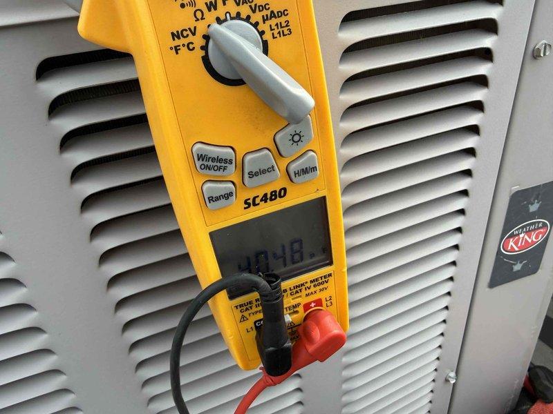 Completed spring preventive maintenance on commercial Weather King HVAC unit. Performed comprehensive system inspection per checklist, recorded updated equipment specifications and filter information, and took electrical measurements using clamp meter to verify proper system operation. All findings documented with photographs for service records.