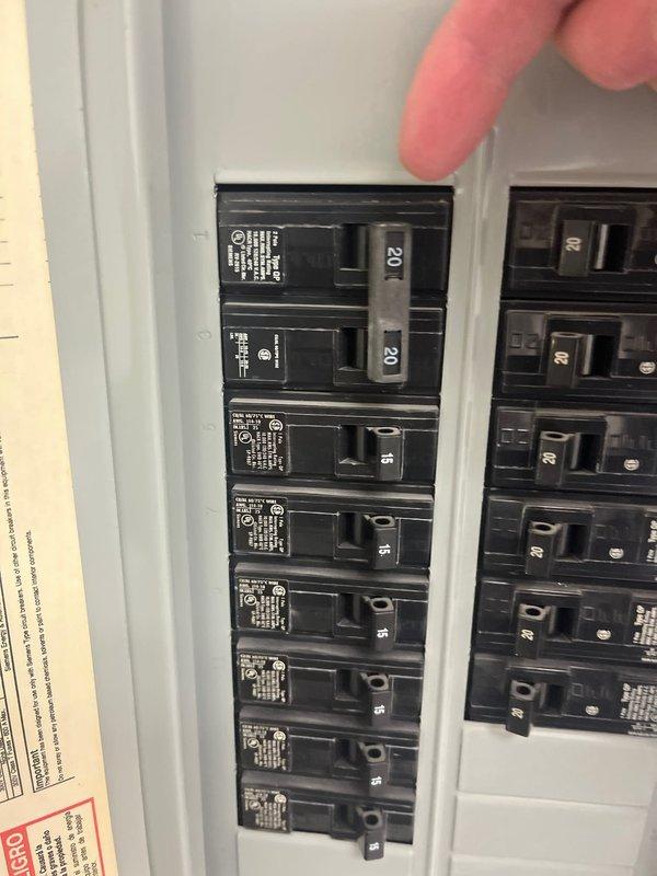 Completed estimate for full HVAC system replacement including air conditioning unit and air handler for new customer. Documented existing electrical panel configuration showing 529 address marking and current breaker setup with adequate capacity for new equipment installation. Assessed installation requirements and provided comprehensive replacement proposal for complete system upgrade.