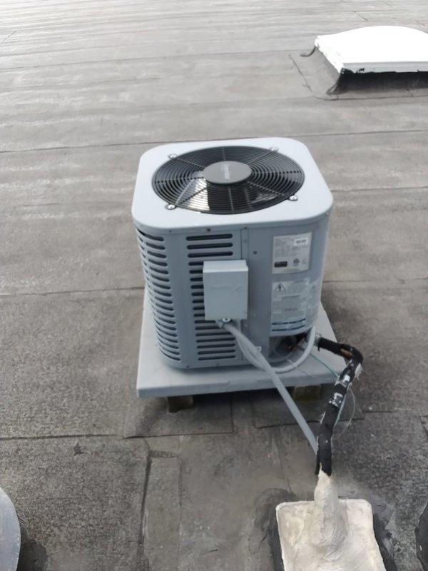 Completed spring commercial preventative maintenance on rooftop air conditioning system per contract agreement. Performed comprehensive inspection checklist including electrical diagnostics with multimeter, verified condenser unit operation, inspected refrigerant lines and connections, and documented current equipment specifications and filter requirements for system records.