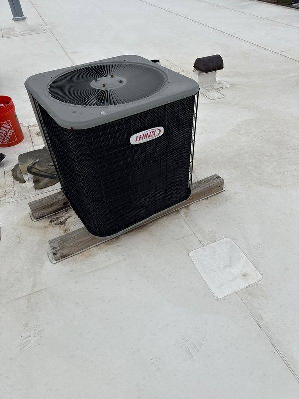 Completed spring preventive maintenance on Lennox rooftop air conditioning unit per commercial service agreement checklist. Performed visual inspection of condenser unit, verified electrical connections and components, and took voltage/amperage readings using digital multimeter to confirm proper system operation. Updated equipment information and documented filter specifications for maintenance records.