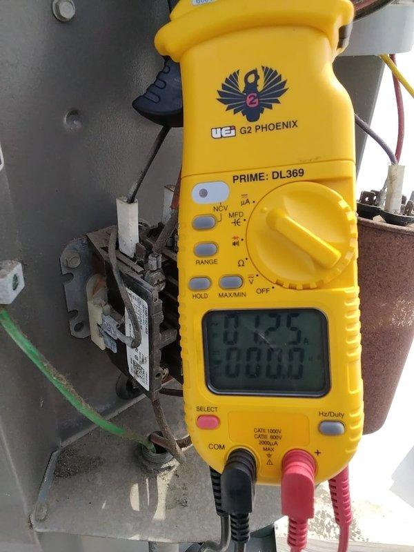 Completed spring preventive maintenance on Lennox rooftop air conditioning unit per commercial service agreement checklist. Performed visual inspection of condenser unit, verified electrical connections and components, and took voltage/amperage readings using digital multimeter to confirm proper system operation. Updated equipment information and documented filter specifications for maintenance records.