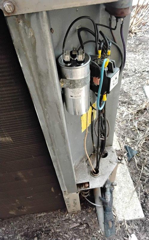 Replaced two failed capacitors on commercial HVAC unit as previously diagnosed: one 40/5 MFD dual run capacitor and one 35/5 MFD dual run capacitor. Verified proper electrical connections, tested system operation, and confirmed unit returned to normal functionality. Collected outstanding invoice payment and discussed seasonal boiler shutdown options with facility management.