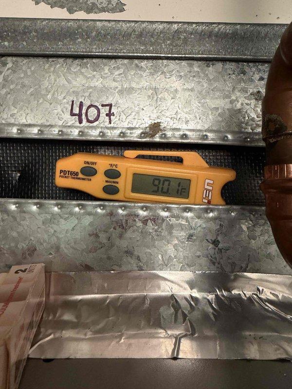 Responded to heating service call but unable to complete diagnostic due to boiler system being in warm weather shutdown mode caused by elevated outdoor temperatures. Verified thermostat displaying 73°F actual temperature with 76°F setpoint in heat mode, and documented supply air temperature reading of 90.4°F at evaporator coil location #407. Rescheduled return visit to test heating operation when outdoor conditions allow boiler system to operate normally.