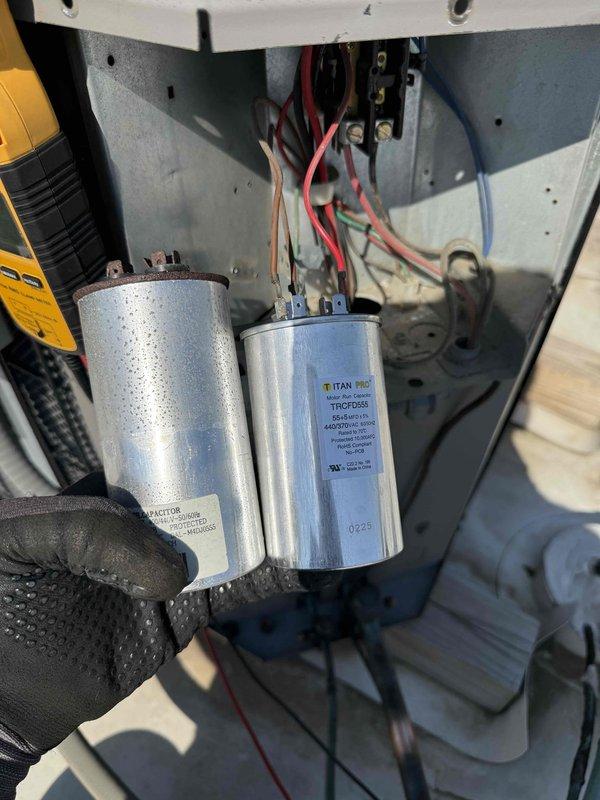 Responded to commercial HVAC service call and diagnosed failed capacitors affecting system operation. Removed two deteriorated capacitors from the unit, including one showing significant weathering, rust, and surface deterioration. Installed new TITAN PRO replacement capacitors rated at 440/370VAC per manufacturer specifications. Verified proper electrical connections at terminal blocks, ensured secure mounting, and tested system operation to confirm restoration of normal function.
