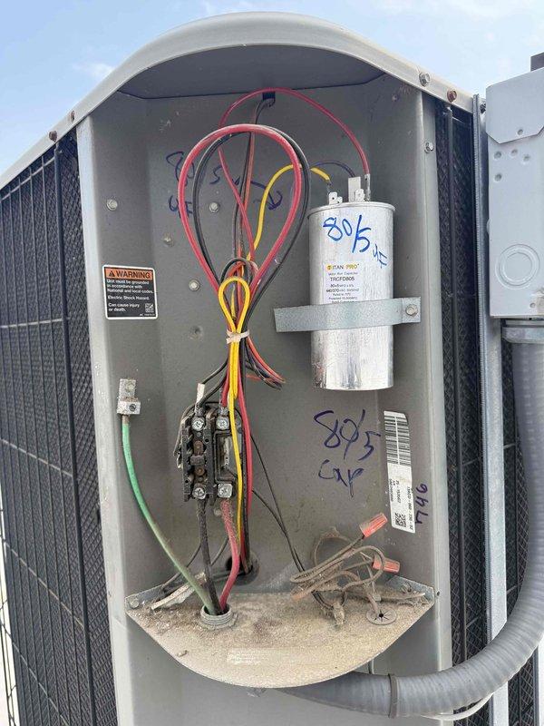 Completed spring preventive maintenance inspection on commercial rooftop HVAC unit. Performed comprehensive system evaluation including electrical component inspection, verified capacitor specifications (396 MFD), checked contactor operation, and documented equipment data per maintenance checklist. Removed debris accumulation from electrical compartment and updated equipment information for filter tracking system.