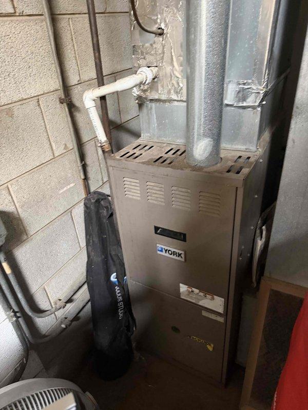 Completed spring preventive maintenance on commercial HVAC system including rooftop condensing unit and basement York furnace. Performed comprehensive checklist inspection, documented equipment specifications and filter information for system records, and captured photographic documentation of all serviced equipment. Coordinated tenant availability prior to service entry and updated office with current equipment status and any required filter list modifications.