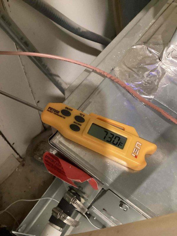 Responded to warranty callback regarding reported noise from recently installed HVAC unit and concern about missing sensor. Performed thorough inspection of attic installation, verified all components present and properly installed including temperature sensors, ductwork connections, and damper assembly. Documented supply plenum temperature reading of 130.2°F indicating proper system operation. Inspected condensate drain assembly with float switch, confirmed proper drainage function and verified drain pan collecting condensation as designed. All installation components accounted for and functioning within manufacturer specifications, no missing parts identified.