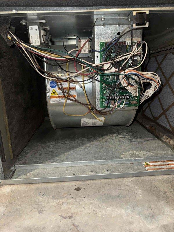 Performed comprehensive Comfort Plan clean and check maintenance on single HVAC system. Conducted thorough inspection of indoor air handler unit, examining blower motor assembly, control board functionality, and electrical connections. Verified proper operation of all internal components including wiring harnesses and safety controls. Proceeded to outdoor condensing unit where capacitor was inspected and tested for proper microfarad rating and electrical performance. Evaluated all wire connections, terminals, and contactors within outdoor electrical compartment. Cleaned accessible components and removed debris accumulation from both indoor and outdoor units. Verified system operation through complete heating and cooling cycle. All components found operating within manufacturer specifications. System performing as designed with no immediate service needs identified.