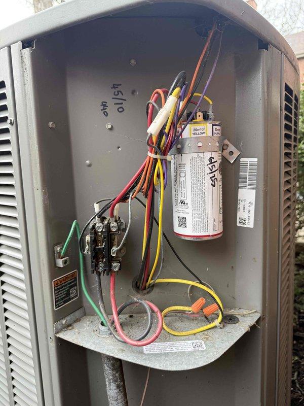 Completed annual clean and check maintenance on air conditioning system per Gold Comfort Plan agreement. Upon arrival, found outdoor condenser unit with heavy accumulation of dirt, debris, and organic matter clogging heat exchanger coils, significantly restricting airflow. Removed access panel and inspected electrical components including contactor, capacitor, and wiring connections—all found to be in serviceable condition. Thoroughly cleaned condenser coils to restore proper heat transfer efficiency and airflow. Verified all electrical connections secure, tested capacitor values within specifications, and confirmed system operational. Collected annual Comfort Plan renewal payment as requested.