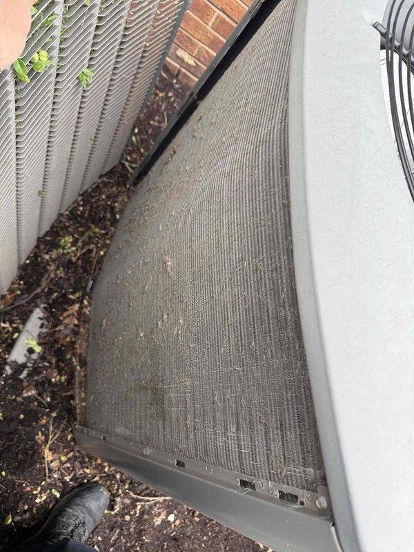 Completed annual clean and check maintenance on air conditioning system per Gold Comfort Plan agreement. Upon arrival, found outdoor condenser unit with heavy accumulation of dirt, debris, and organic matter clogging heat exchanger coils, significantly restricting airflow. Removed access panel and inspected electrical components including contactor, capacitor, and wiring connections—all found to be in serviceable condition. Thoroughly cleaned condenser coils to restore proper heat transfer efficiency and airflow. Verified all electrical connections secure, tested capacitor values within specifications, and confirmed system operational. Collected annual Comfort Plan renewal payment as requested.