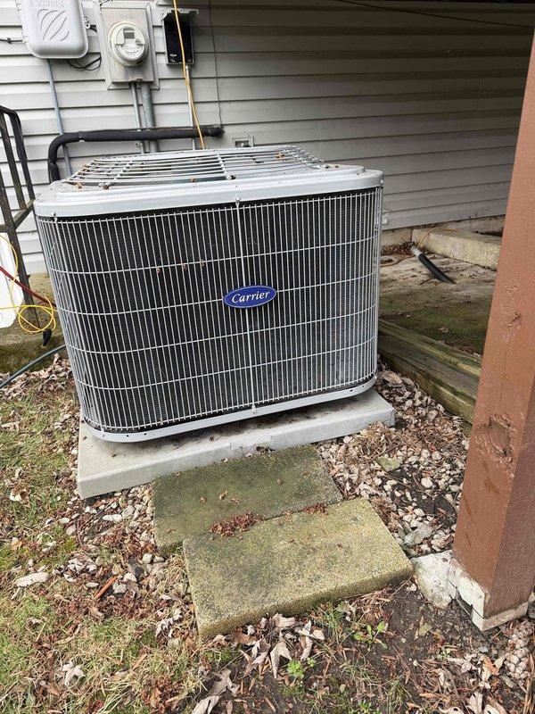 Completed spring clean and check maintenance service on Carrier air conditioning system per comfort plan agreement. Performed comprehensive inspection of outdoor condensing unit including electrical components, capacitor, contactors, and wiring connections. All components found to be in proper working condition with no deficiencies noted. System tested and operating within manufacturer specifications.