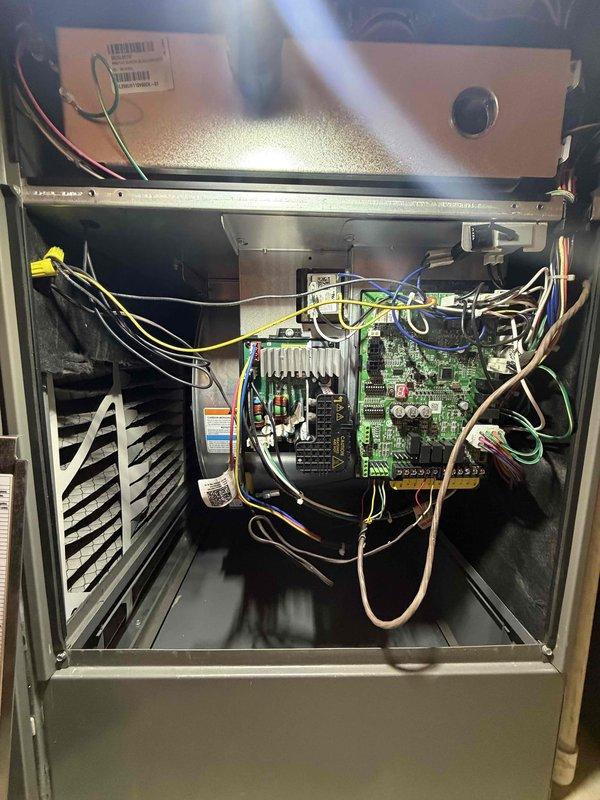 Completed preventive maintenance clean and check on air conditioning system per comfort plan agreement. Performed thorough inspection of air handler unit, including control boards, electrical connections, and wiring harness. Serviced media filter assembly and verified proper airflow through cylindrical pleated filter element.