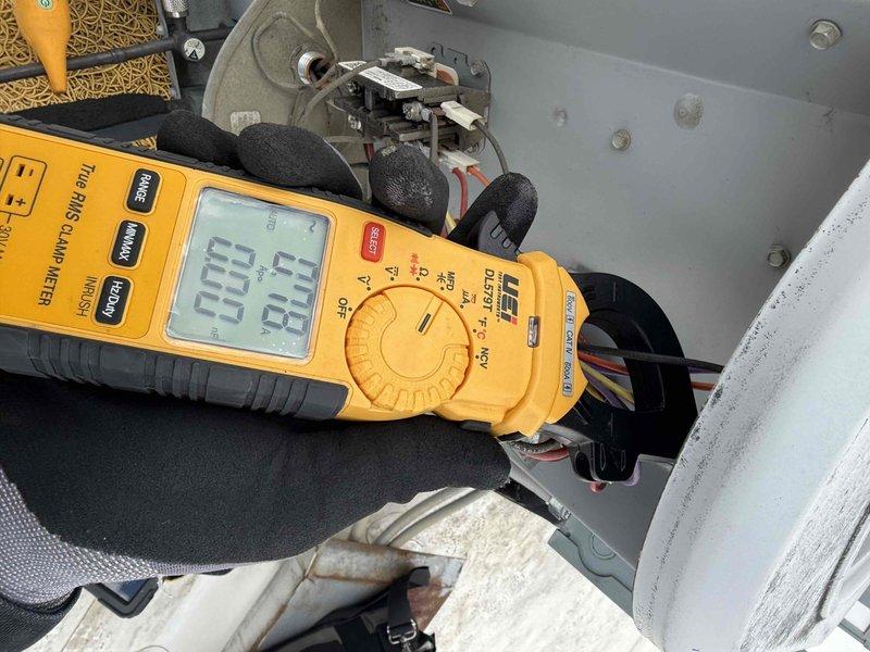 Completed comprehensive tune-up service on rooftop commercial HVAC system. Performed electrical diagnostics using digital multimeter to verify proper voltage and amperage at contactor assembly, confirming all electrical connections were secure and within manufacturer specifications. Replaced 16x20x1 air filter as requested, inspected condenser unit including fan operation and coil condition, and updated equipment information in service records. Informed customer of current promotional offers and recommended scheduling estimate for any additional system improvements.