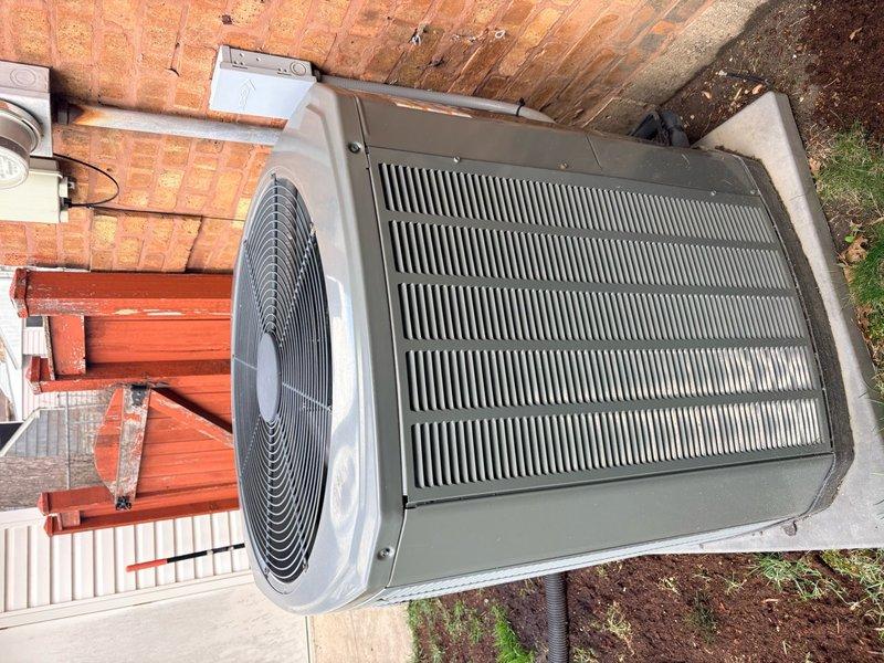 Completed comprehensive tune-up service on a 13-year-old residential air conditioning system found to be in excellent operating condition. Performed standard maintenance procedures including inspection of outdoor condenser unit and indoor air handler components, verified proper system operation, and documented equipment condition through photographic records. All components functioning within normal parameters with no issues identified requiring immediate attention.