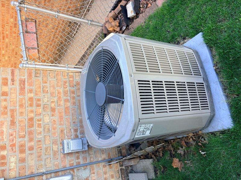 Completed annual clean and check maintenance on Trane air conditioning system per Comfort Plan agreement. Performed comprehensive inspection of outdoor condenser unit including coil cleaning, electrical connection verification, refrigerant level assessment, and fan motor operation check. Verified thermostat operation and calibration showing system cooling properly with setpoint at 63°F and ambient temperature reading 72°F. All components found operating within manufacturer specifications with no deficiencies noted at time of service.