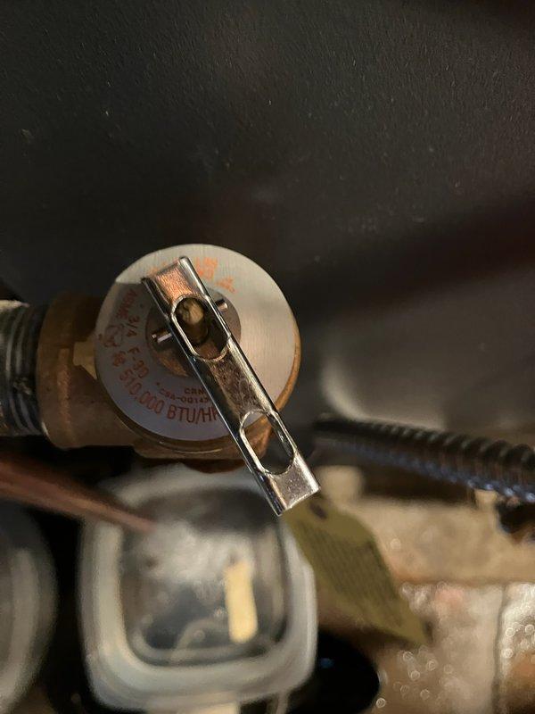 Responded to emergency service call for water leaking from copper pipe on boiler system. Upon arrival, inspected boiler and associated plumbing components, including pressure relief valve assembly and copper piping configuration. Identified source of water discharge from temperature and pressure relief valve. Assessed valve operation, brass fittings, and flexible connector assembly to determine cause of leak. Documented equipment information and current system conditions. Discussed findings with customer regarding pressure relief valve function and recommended repair options to resolve active water leak and prevent potential basement flooding.