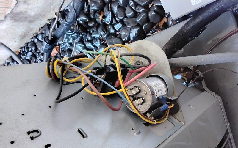 Completed spring clean and check maintenance service on two air conditioning systems per comfort plan agreement. Performed comprehensive inspection of both units, including examination of capacitors, evaporator coils, electrical connections, and refrigerant lines. Evaporator coil showed accumulation of dust and debris, which was addressed during the cleaning process. Verified proper electrical connections with multiple wire terminations to capacitors, checked all wire nuts for secure connections, and inspected condition of insulation materials throughout both systems. All components photographed and documented for service records, with both systems restored to proper operating condition upon completion of maintenance procedures.